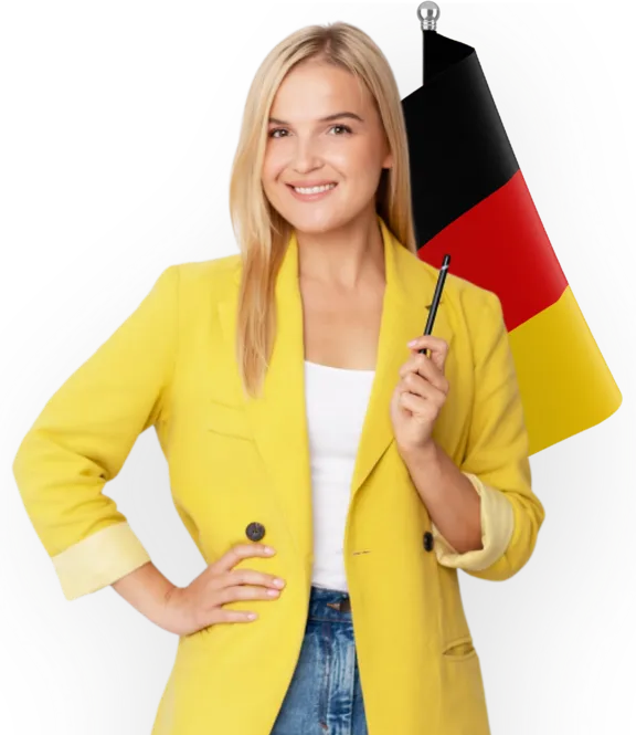 Ania — autorka Nauka-Niemieckiego.net, z niemiecką flagą w dłoni